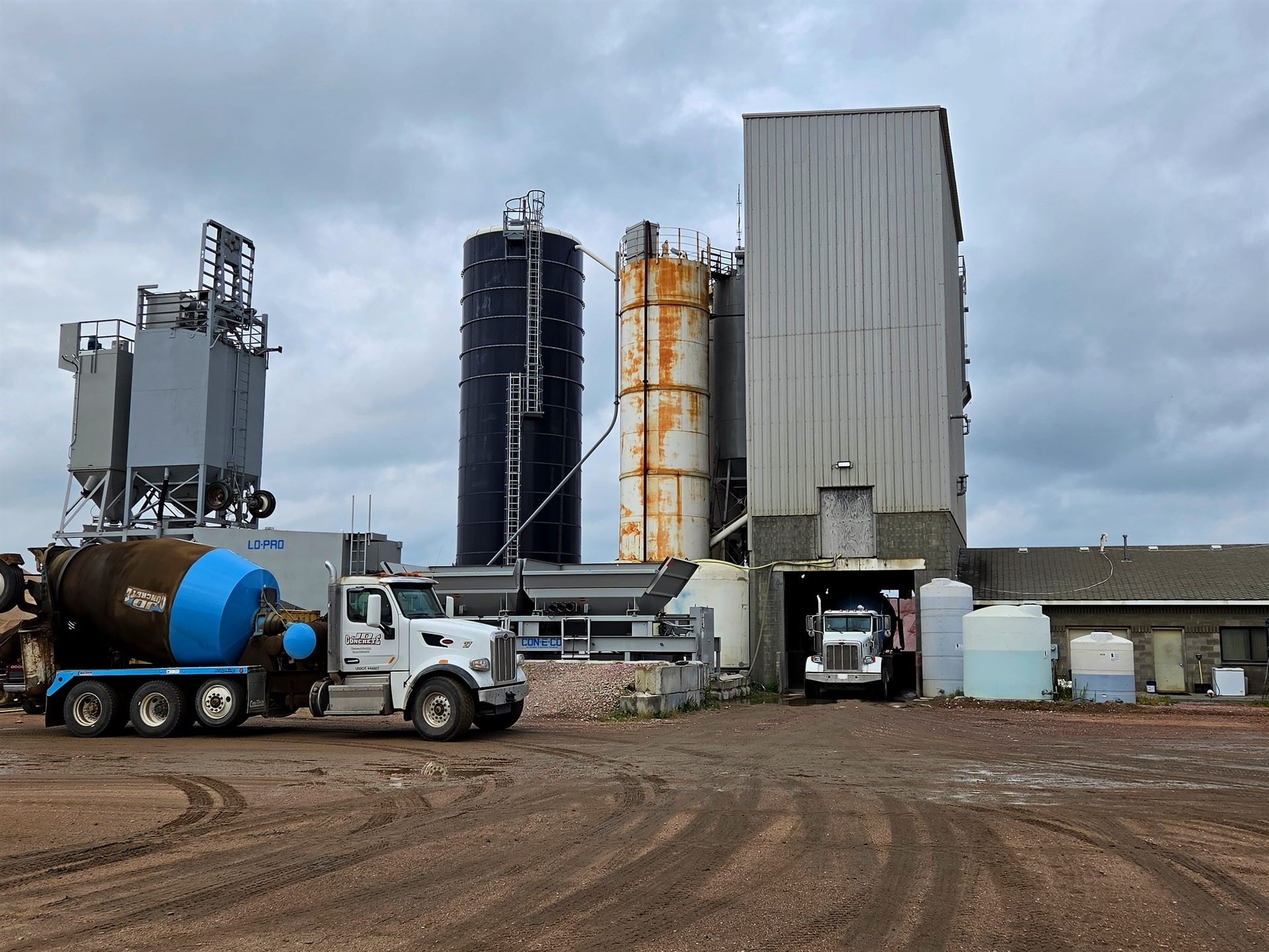 A mixer truck loading at the Con-E-CO plant